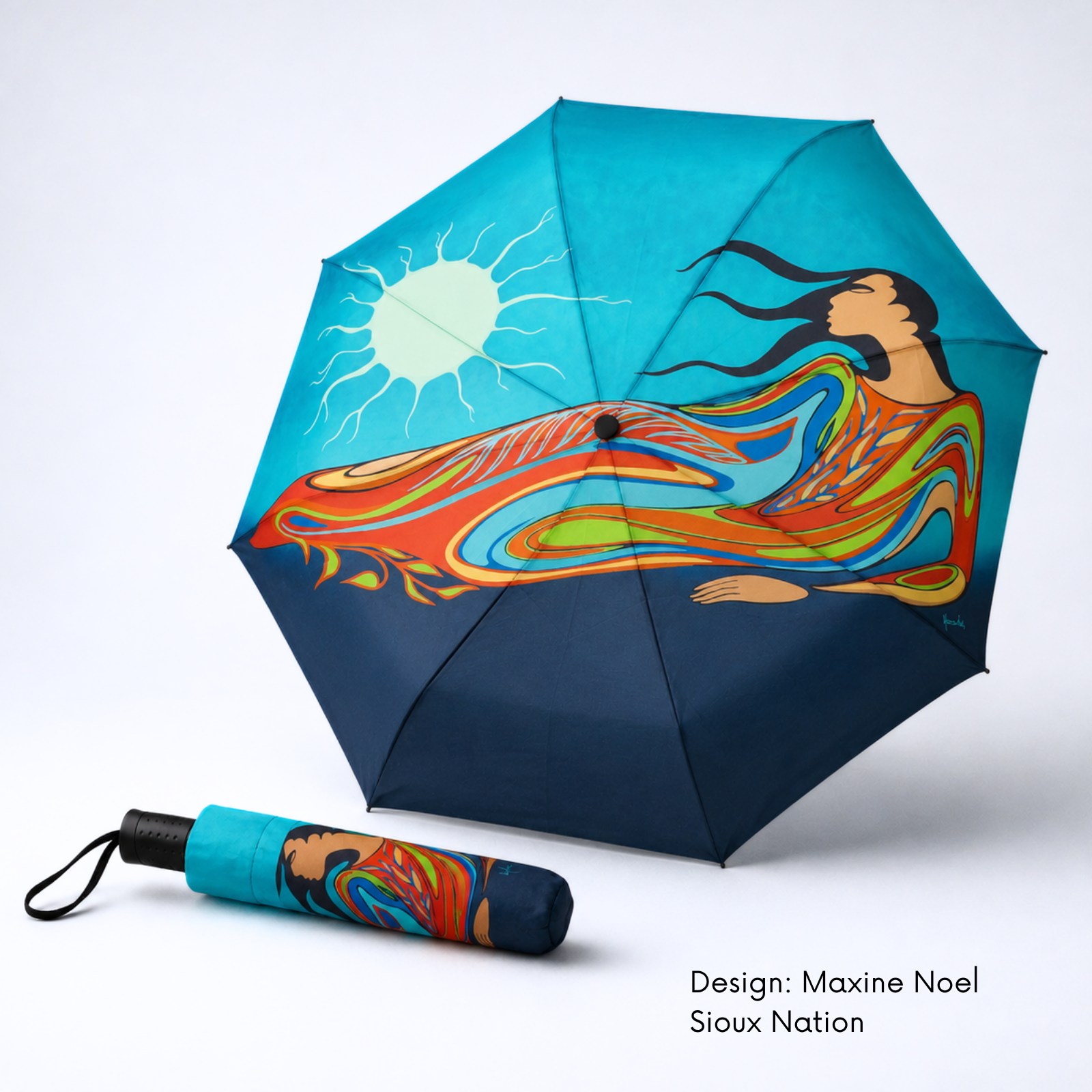 A folding umbrella shown open and closed on a light gray studio background. Automatic folding umbrella featuring Mother Earth by Santee Oglala Sioux artist Maxine Noel, with a windproof frame and soft foam handle.