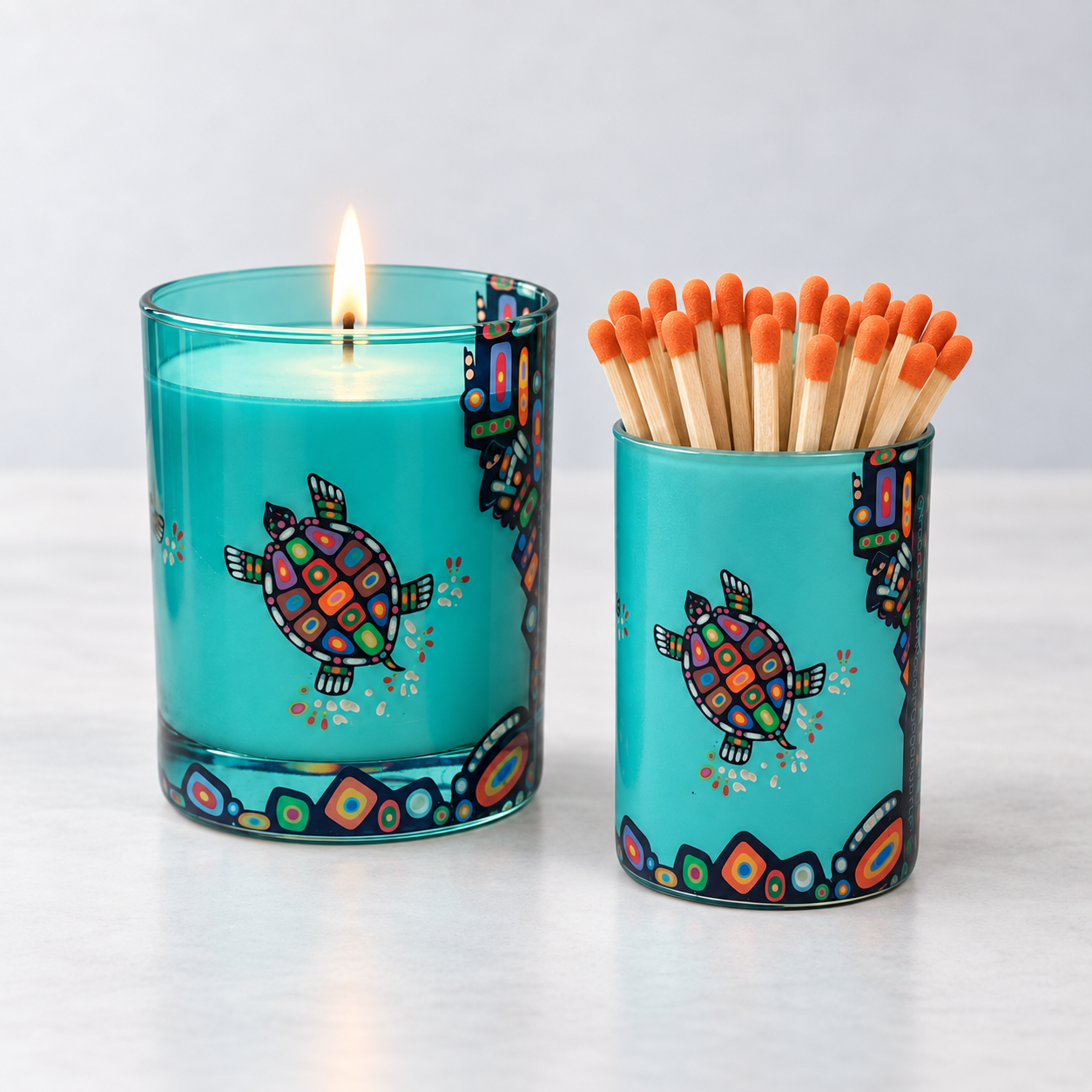Glass match holder featuring John Rombough's Turtle artwork, filled with long matches.